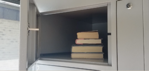 This is an image of an open locker inside the smart locker building.